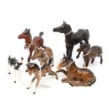 A collection of Beswick animal figures, comprising of Chestnut shade galloping horse, a brown