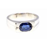 A sapphire and platinum dress ring, the flat top set with an oval sapphire approx 7.7 x 5.5 x 3.6mm,