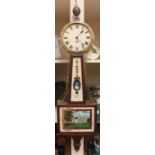 A Waltham Wall Clock, early 20th century American having a cream dial with black roman numerals,