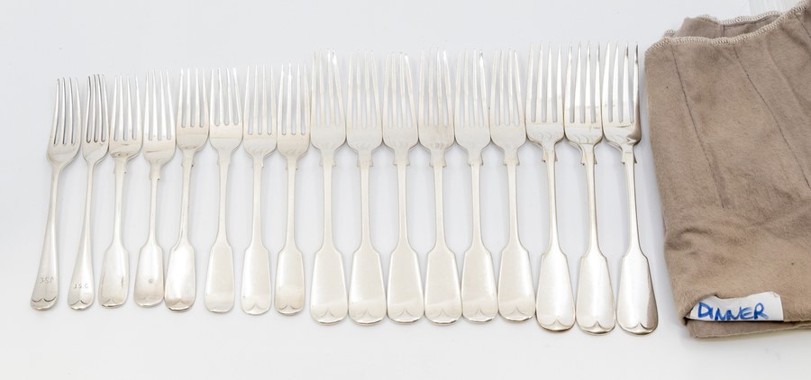 A collection of silver forks to include: a set of six George VI fiddle pattern table forks, by