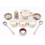 A collection of table silver to include: pair of shell shaped salts, pair of mustard spoons, mustard