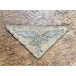 Luftwaffe Tropical Machine Embroidered Eagle, khaki badge on triangular desert tan cloth, used