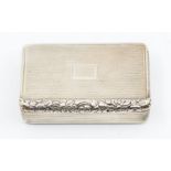 A George III silver snuff box, engraved cover and base with wiggle work, reeded sides and foliage