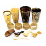 A collection of 19th Century horn beakers, various sizes, one with silver mounted rim and applied