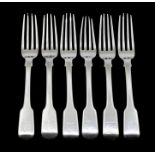 A matched set of six George III silver fiddle pattern dessert forks, each engraved with a crest,