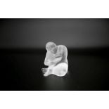 A Lalique frosted glass crouching nude paperweight signed / etched :"Lalique France" (1)