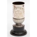 A late Victorian silver presentation beaker with gadroon lower section, presentation inscription