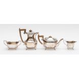 A George V silver matched four piece tea service comprising: teapot, hotwater jug, sugar bowl and