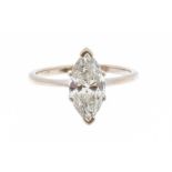 A diamond and 18ct white gold solitaire ring, comprising a claw set marquise cut diamond weighing