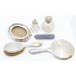 A collection of silver to include: early 20th Century silver mounted dressing table to include a
