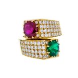 An emerald, ruby and diamond ring, by Loris Abate Milan circa 1980, comprising a cross over design