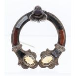 A Victorian Scottish hardstone plaid brooch, comprising open horse shoe shaped design, the white