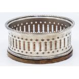 A silver-plated magnum wine coaster, gadrooned edge, pierced gallery, turned wooden base, approx