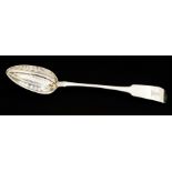 Irish Interest: A George III Irish silver large fiddle pattern straining spoon, with rat tail, the
