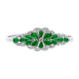 A jade type diamond set white metal bracelet, comprising a foliate cluster of pear shaped cabochon