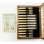 A matched set of six George VI silver mounted fish knives and forks, Sheffield, 1931 & 1933, in