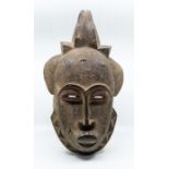 Tribal Interest Cote D'Ivoire - Ivory Coast Baule or Baoulé mask, approx 47cm Purchased in Abidjan