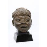 Sir Jacob Epstein (British, 1880-1959) Portrait of a Young Boy, bronze, signed, approx 23cm high, on