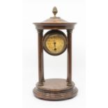 Mantel clock supporting single train French movement between 4 wooden pillars 2 ½” paper dial.