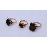 A 9ct smokey garnet ring, a 9ct ring set bloodstone and another ring. total weight approx. 14.2g (