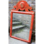 A red-japanned mirror in early 18th century style, decorated with gilt sprigs, the oblong plate