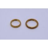 Two 22ct gold wedding bands total approx. 10.5g