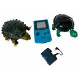 Game Boy Colour with Pokemon Silver Version game. Also included is 2x Turtle Toys. Game Boy