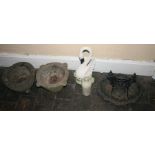 A collection of Victorian household wares comprising:- two stone mortars, one cast iron boot