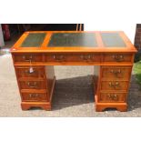 A traditional twin pedestal writing desk, 78cm high, 124cm wide, 60cm deep