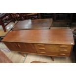 A 1960s Jentique teak sideboard comprising of two cupboard doors, enclosing large area and a single