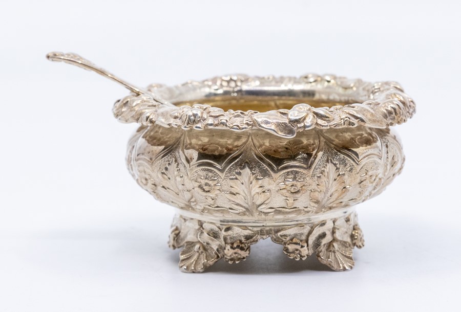 A George IV silver-gilt large circular salt, border and body chased with flowers and foliage, on - Image 3 of 3