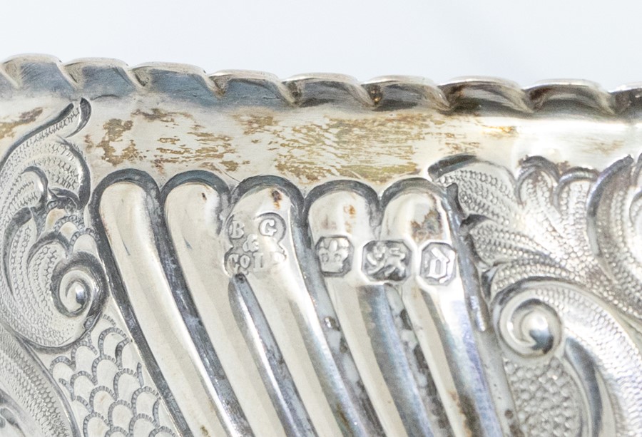 A late Victorian silver boat shaped sugar basket, chased fluted, floral and geometric decoration, - Image 2 of 2