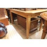 A contemporary oak dining suite, comprising oak extending dining table, fitted with two extra