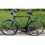 A Raleigh three gear bicycle with a brown leather Brooks 70 suspension seat, circa 1953, complete