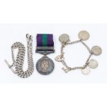 A Malaya Elizabeth II Silver Medal, a Silver Bracelet with Francs and a Silver Watch Chain, Total