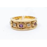 A 9ct gold stone set dress ring, comprising oval cut sapphire, ruby and amethyst with diamond
