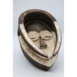 An African Tribal mask, white heightening to face and horns  Provenance: from a Private collection