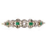 A diamond and emerald 18ct gold bracelet, comprising four rectangular cut emeralds set row with