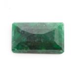 A large 332carat emerald cut emerald, measuring approx 60 x 40mm, along with Gemological
