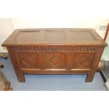 A late 17th Century joined oak chest, having a three panel lid opening to reveal a storage area and