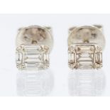 A pair of diamond and 18ct white gold cluster studs set with baguette and brilliant cut diamonds,