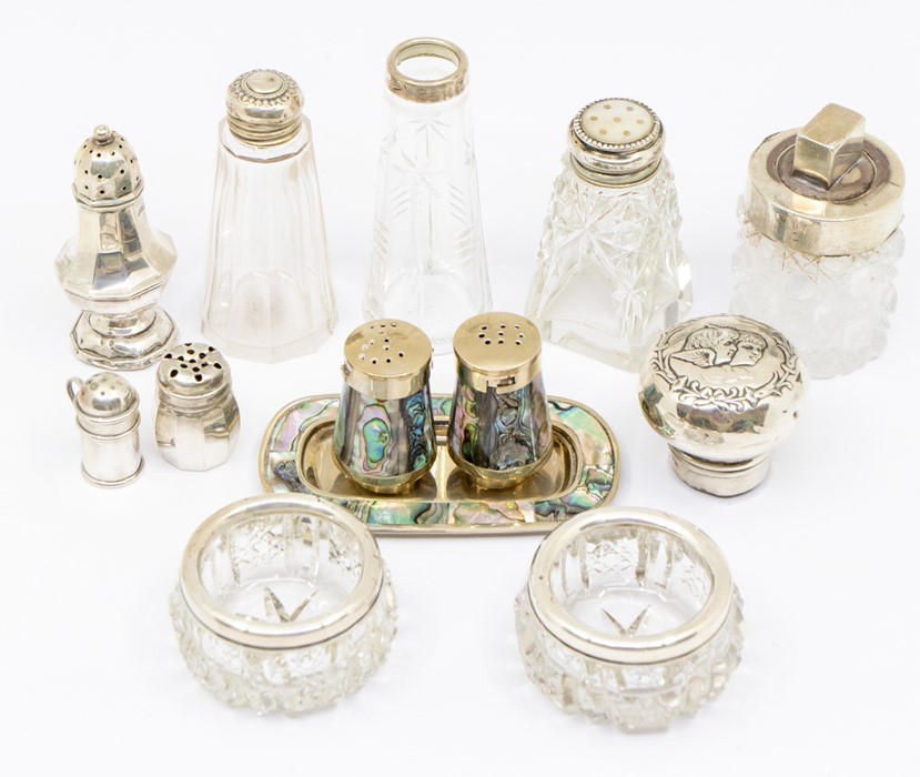 A quantity of silver mounted cut glass condiment bottles, various dates and makers (Q)