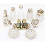 A quantity of silver mounted cut glass condiment bottles, various dates and makers (Q)
