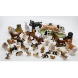 A 20th Century Staffordshire figural group of racing greyhounds together with a large collection