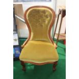 A Victorian mahogany spoon back chair, deep buttoned back