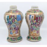 A pair of Canton vases (one damaged and old repairs to collar)