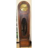 A George V oak longcase clock, brass dial, the mechanism striking on gongs