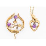 A 9ct Art Nouveau style Brooch set amethyst, open work of leaf and foliate decoration, set with