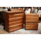 A contemporary rosewood part bedroom suite, comprising chest of five drawers, with two matching