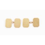 A pair of 9ct gold cufflinks - rectangular form  with engine turned decoration, weight approx 9.3gms